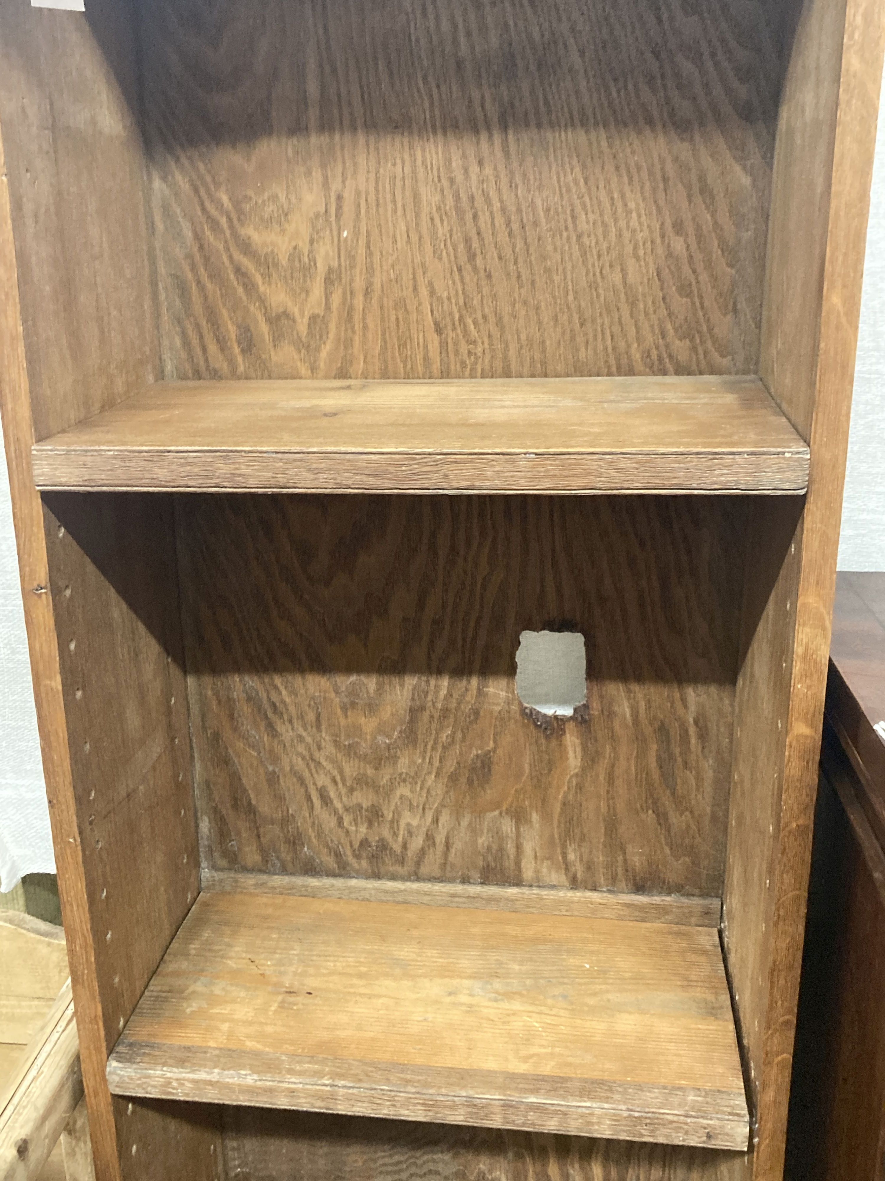 A narrow oak and pine open bookcase, length 49cm, depth 23cm, height 176cm